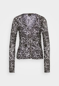 Schwarz-weißes Langarm-Cardigan mit V-Ausschnitt, das ein wirbelndes Tierdruckmuster und eine subtile Textur aufweist. Vorderer Knopfverschluss.