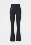 MOTION FLARE PANT - Leggings - black