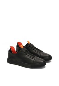 Black leather sneakers with rubber soles, contrasting orange lining, and black laces. Features round toe and high ankle cut.