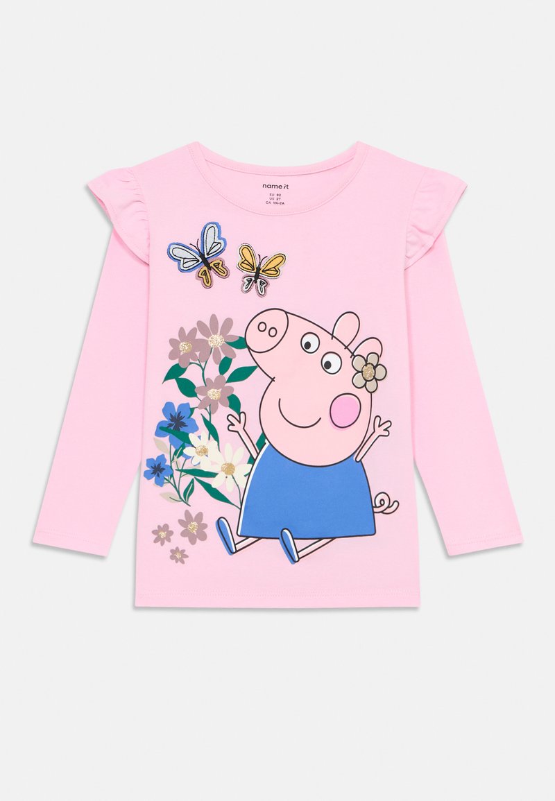 Camisetta a maniche lunghe per bambini di colore rosa, con un maialino dei cartoni animati che indossa un vestito blu, circondato da fiori e due farfalle sopra.