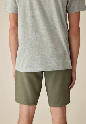 REGULAR FIT - Shorts - sage green