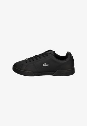 Black leather sneaker with textile accents, round toe, rubber sole, and lace-up closure. Features a silver logo on the outer side.