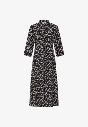Sort midi-kjole med små blomsterprint i pink og hvid, lange ærmer og en krave.