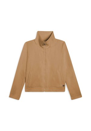 Giacca zip-up beige con colletto alto, due tasche laterali e dettaglio del logo sull'orlo, caratterizzata da una texture di tessuto morbido e liscio.