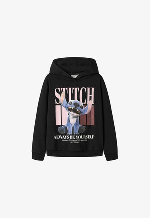 Sweat à capuche noir avec un graphisme coloré de Stitch de Lilo & Stitch et texte disant "STITCH Always be yourself."