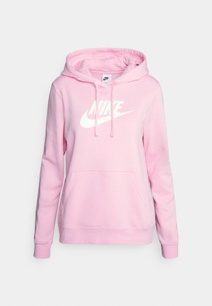 Jasnoróżowa bluza z kapturem Nike z kieszenią z przodu i ściągaczem w kapturze, z dużym białym logo Nike na piersi.