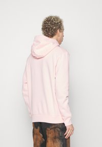 Nike Sportswear SPORTSWEAR CLUB FLEECE - Ikdienas džemperis - pink bloom