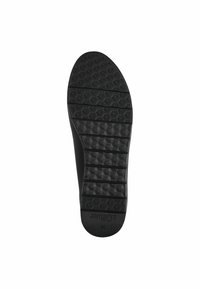 Semelle de chaussure en caoutchouc noir avec une surface texturée composée de motifs hexagonaux et de crêtes, offrant une adhérence et une stabilité. Taille 37 marquée au bas.