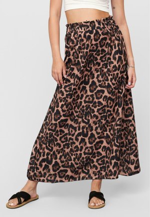Leopard print maxi skirt in lightweight fabric, featuring an elastic waistband and a flowy silhouette. It has shades of brown and black.