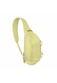 Bandolera verde claro con un acabado texturizado, compartimentos con cremallera, correa acolchada y logotipo de Osprey. Diseño compacto adecuado para el uso diario.