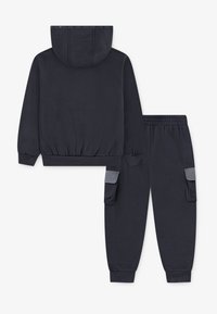 Nike Sportswear UTILITY SET - Treniņtērps - smoke grey