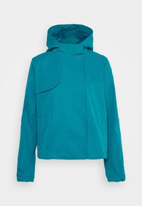 Teal huva jacka med en strukturerad design, långa ärmar, elastiska muddar och en asymmetrisk klaffdetalj på framsidan. Slät tygtextur.