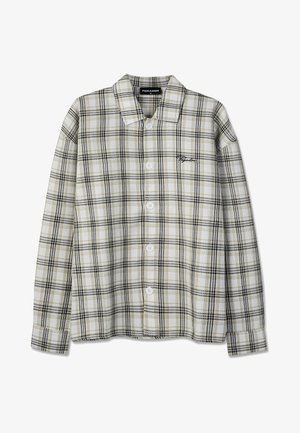 Long-sleeve button-up shirt with beige, white, and black plaid pattern and black embroidered logo on left chest.