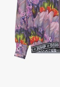 Molo Trainingsjacke - cacatua