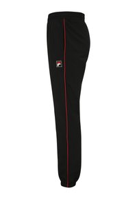 Zwarte sportbroek in een slim ontwerp, met een rode zijkant en een klein logo patch. Gemaakt van zachte, lichte stof met elastische boorden.