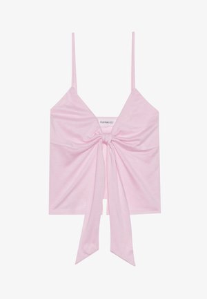 Top sans manches rose avec un détail de nœud à l'avant, doté de fines bretelles et d'une texture douce et lisse. Design décontracté avec une coupe légèrement ample.
