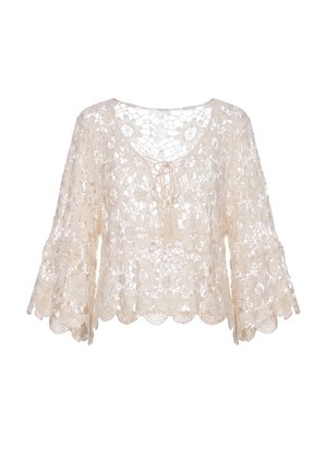 Crèmekleurige gehaakte kanten blouse met bloemmotief, driekwart wijde mouwen, ronde hals en voorstrik met tassels.