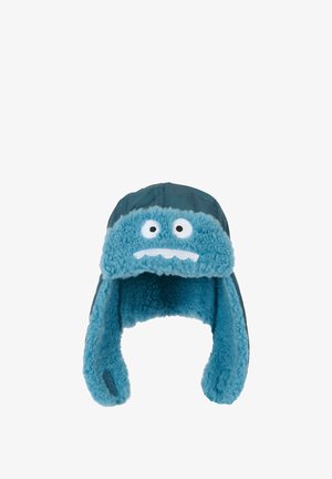 Niebieska pluszowa zimowa czapka z futrzanym wykończeniem, z motywem twarzy z dwoma oczami i ustami, ciemnoniebieski zewnętrzny materiał, z klapami na uszy.