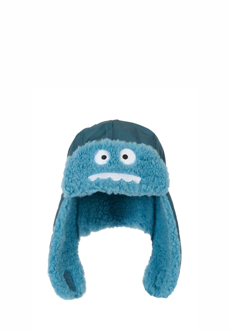 Cappello invernale blu in peluche con fodera pelosa, caratterizzato da un design facciale con due occhi e una bocca, esterno blu scuro, alette per le orecchie.