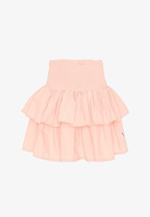 Gonna a balze rosa chiaro con vita elasticizzata arricciata e due strati di volant raccolti, vista dall'alto su sfondo bianco.