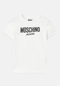 White cotton t-shirt with short sleeves. Features black printed text "MOSCHINO JEANS" across the front, crew neckline, and standard fit.