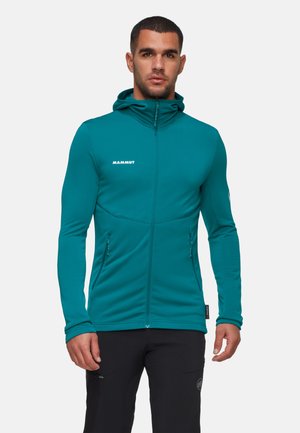 Teal Kapuzenjacke mit vollem Reißverschluss, mit einer taillierten Passform, langen Ärmeln und zwei Seitentaschen. "Mammut"-Logo in Weiß auf der Brust gedruckt.