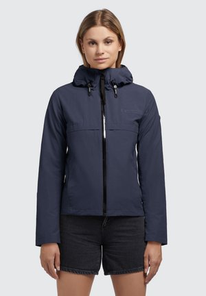 Navy blue waterproof jacket with a hood, front zipper, and two zippered pockets. Features a smooth texture and adjustable drawstrings.