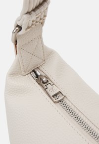 Calvin Klein Jeans ULTRALIGHT SHOULDERBAG - Handbag - eggshell