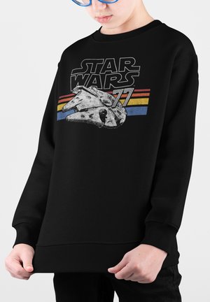 Černá mikina s potiskem Millennium Falcon a textem "STAR WARS 77" v bílé a červené barvě, s vodorovnými pruhy v žluté a modré.