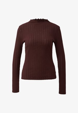 Brūns ribots garām piedurknēm tops ar augstu apkakli, kas rotāts ar viļņainu apdari. Izgatavots no mīksta, strukturēta auduma, ar pieguļošu siluetu.