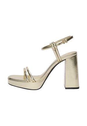 High heeled sandals - gold coloured