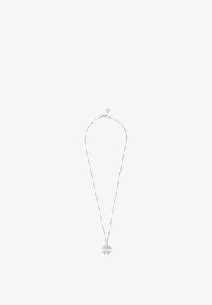 Delicate silver chain necklace with small beads and a pendant shaped like a four-leaf clover.