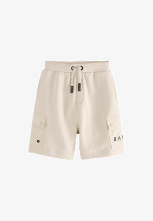 Beige cotton shorts with an adjustable waistband, two side pockets, and a cargo pocket featuring a snap button and logo detail.