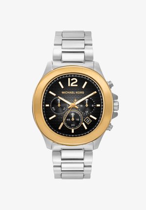 Silver metal band watch with gold bezel, black dial, three subdials, gold hour markers, hands, and date display at 4 o’clock, Michael Kors branding.
