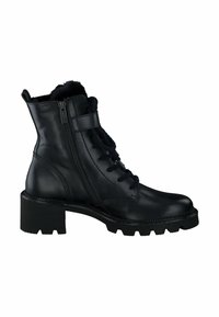 Zwarte leren enkellaarsjes met een vetersluiting aan de voorkant, zijritsen, een fuzzy voering en een chunky, gestructureerde zool.