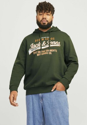 Green cotton hoodie with a front graphic in orange and white text. Features a drawstring hood and ribbed cuffs. Worn with light denim jeans.
