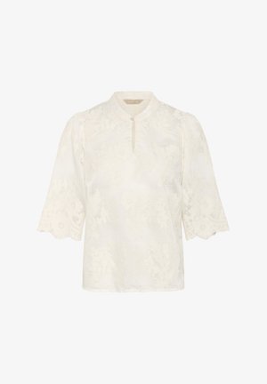 Fehér virágmintás hímzett blúz mandarin gallérral, háromnegyedes puff ujjakkal és gombos nyakkivágással. Strukturált anyag.