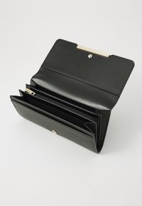 Black leather wallet with a textured finish, featuring multiple card slots, a zippered compartment, and a gold-tone clasp closure.