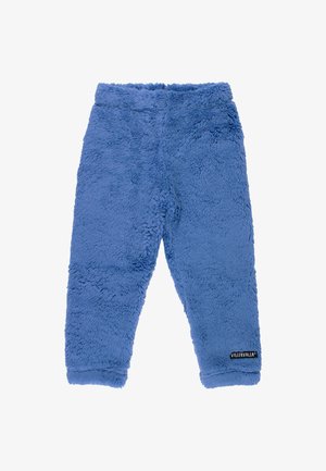 Fleece pants in soft blue with a textured surface, featuring a tapered design and a black logo label at the hem.