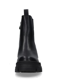 Schwarze Leder-Ankle Boots mit glatter Oberfläche, runder Zehenpartie, strukturiertem Gummisohle und einer Ziehhilfe an der Rückseite für einfaches An- und Ausziehen.