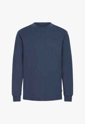 Granatowa koszula z długim rękawem wykonana z bawełny, z prostym okrągłym dekoltem, ściągaczami na rękawach i prostym dołem. Gładka faktura bez wzorów.