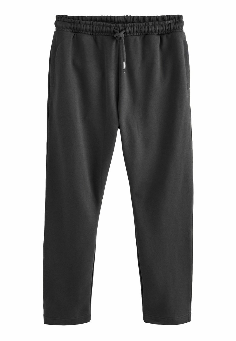 Zwarte sweatpants van zachte stof, met een elastische tailleband en een trekkoord, en taps toelopende pijpen met ribboord.
