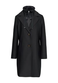 Cappotto nero dalla silhouette aderente, con colletto e chiusura doppiopetto con bottoni marroni. Include un cappuccio imbottito.