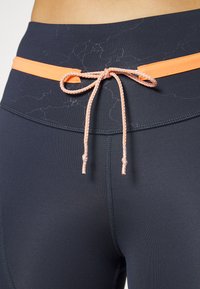 Puma RUN FIRST MILE BIKER - Leggings - parisian night