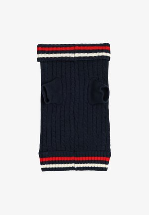 Merino villasta neulotut tummansiniset säärystimet, joissa on härkäkaapelin kuviointi. Yläosassa on punavalkoinen raidallinen koriste ja jalkojen aukot.