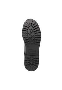 Zwarte laarszool met diep structuurpatroon, maat 42, en het logo "Travelin'" op het middendeel van het profiel.