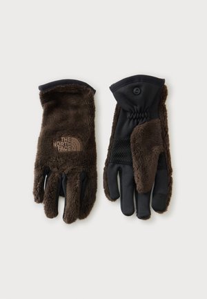 Coppia di guanti in pile marrone scuro con palme nere, polso elasticizzato e logo The North Face sul retro del guanto sinistro.