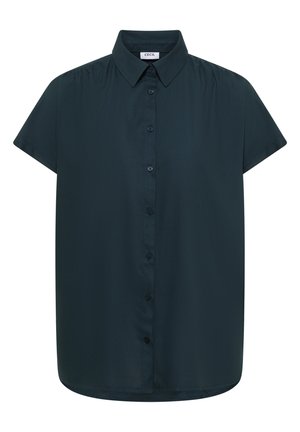 Blouse vert foncé à manches courtes, boutonnée, avec un col pointu et un ourlet légèrement arrondi.