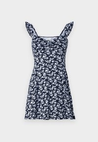 Navy blue dress with white floral print, features spaghetti straps, gathered front detail, and flared skirt reaching above the knee.