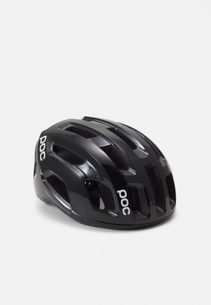 Casque de vélo noir avec de multiples évents et une finition lisse et brillante. Présente le logo "poc" en blanc sur le côté.